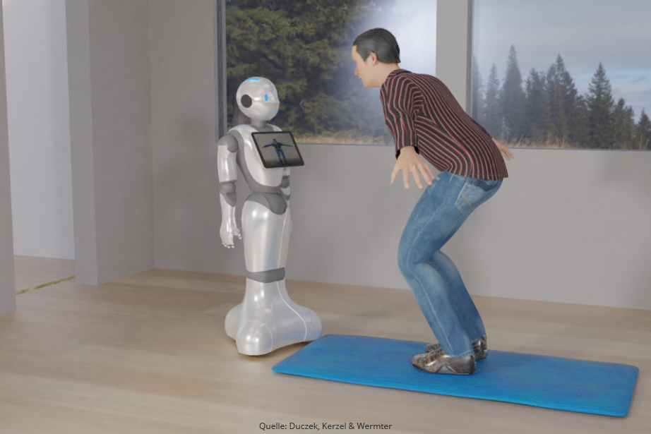 Forschungsprojekt KI-SIGS: Mann trainiert mit Roboter der mittels Tablet Übungen anzeigt